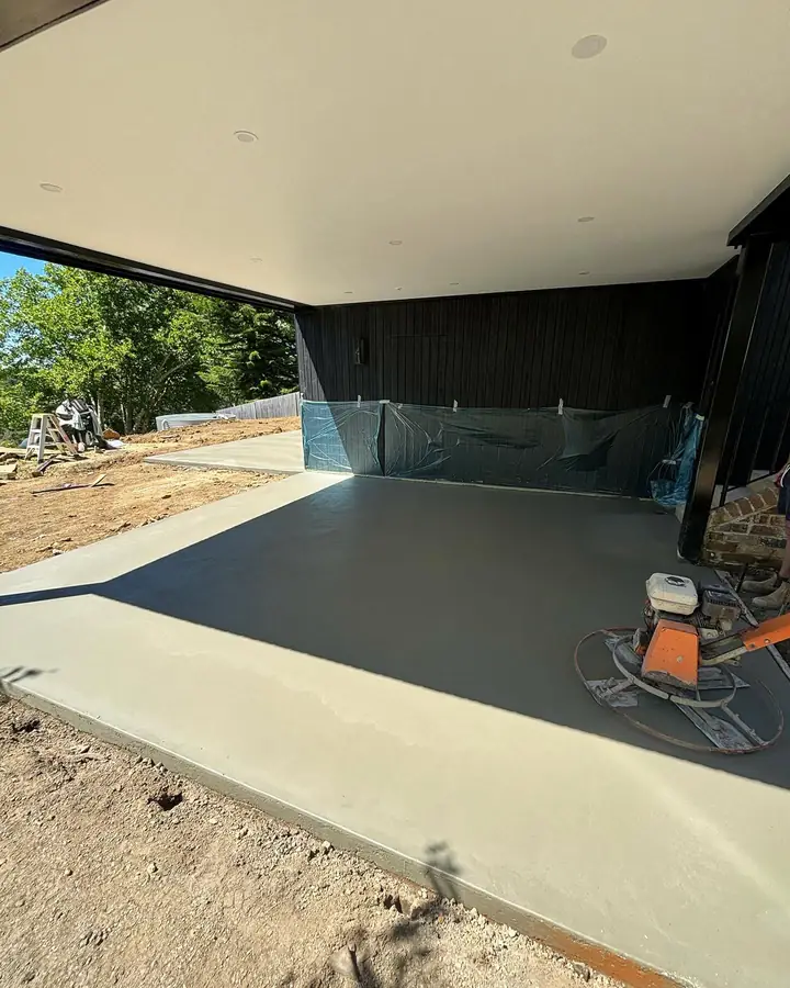 Carport slab power trowel