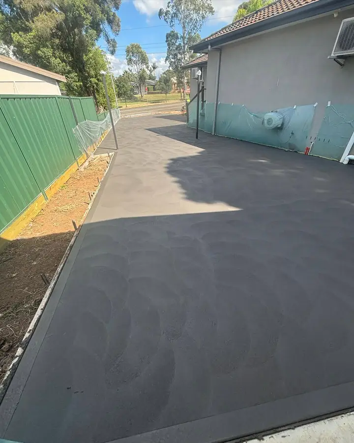 Charcoal driveway fence line
