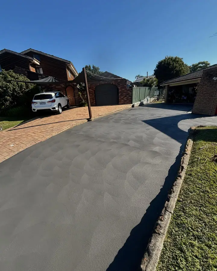 Charcoal driveway replaced pavers