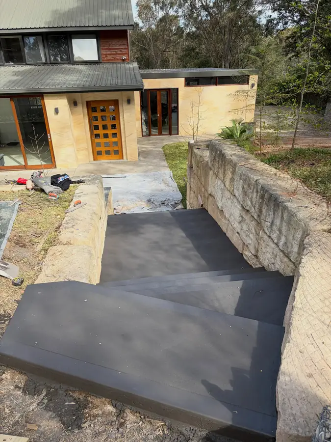 Charcoal path sandstone house