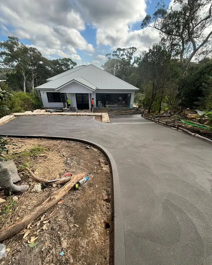 Curved driveway white cottage