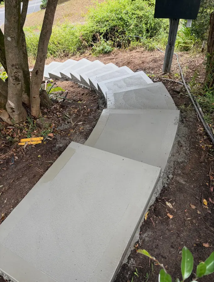 Curved garden steps below