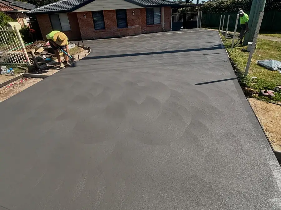 Driveway crew finishing