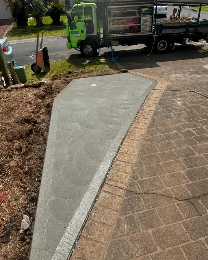Driveway next to pavers