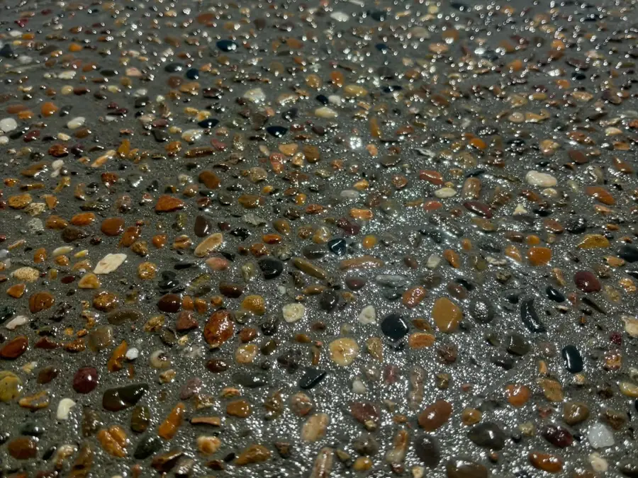 Close-up of exposed aggregate showing coloured river pebbles