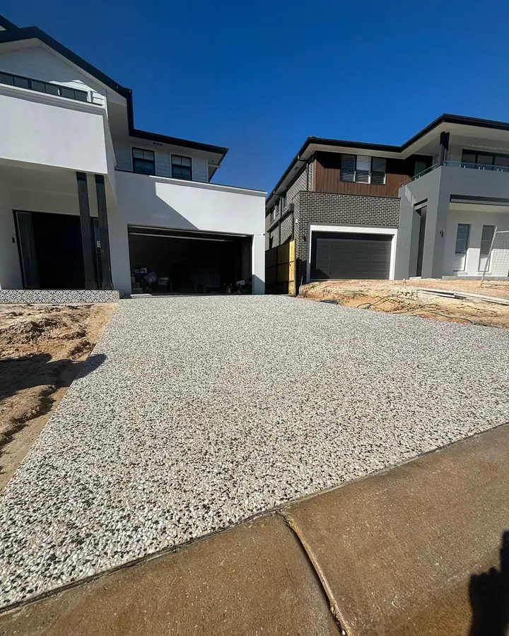 Exposed driveway two storey