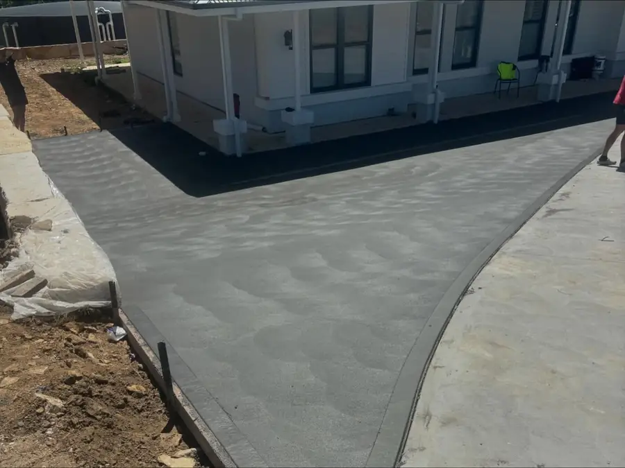 Two-tone driveway with a plain border and charcoal centre